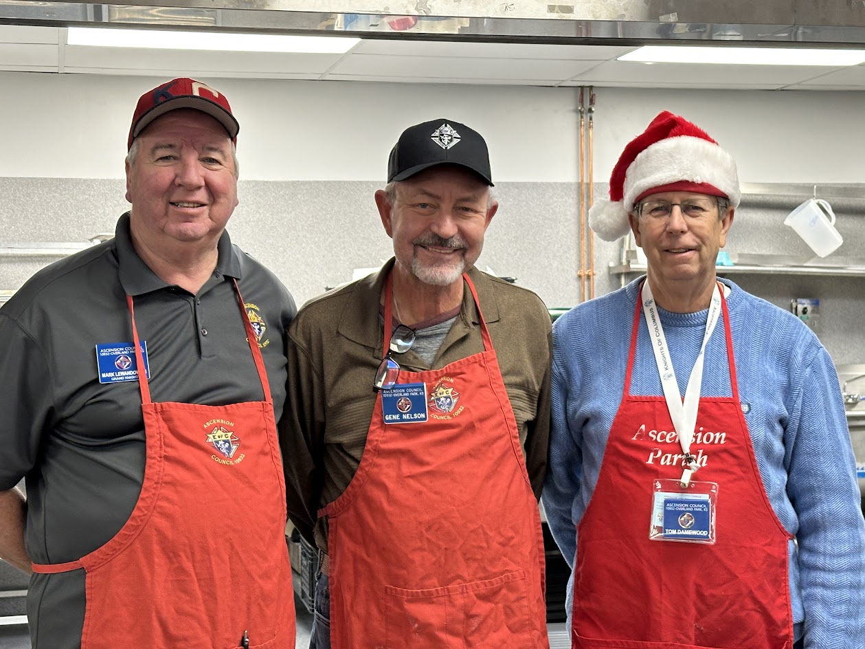 M. Lewandowski, G. Nelson and T. Damewood helped serve coffee and hot chocolate when Santa visited Ascension last Saturday.